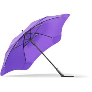 A purple BLUNT Classic Umbrella with a black handle, featuring a sleek design and a sturdy frame.