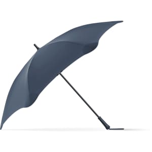A navy blue umbrella with a sleek design and a curved canopy, featuring a black handle and an understated logo.