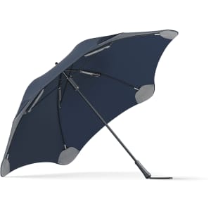 A navy blue umbrella with a unique shape and a sturdy pole, featuring a logo on the surface.