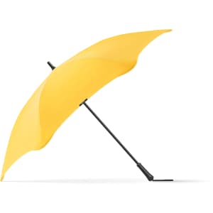 A yellow umbrella with a black handle and pole, featuring a sleek design and a branding logo.