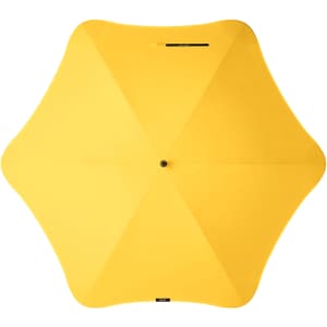 A yellow umbrella with a unique star shape, featuring a central button and a logo.
