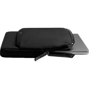 A black laptop caddy with a sleek design, featuring a zip closure and a smooth surface.
