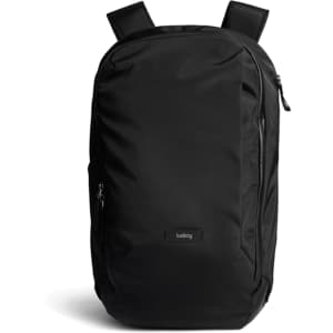A sleek black backpack featuring adjustable straps and zippered compartments, with a subtle logo on the front.