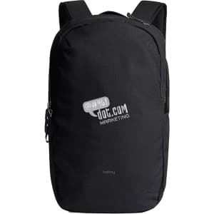 A black Bellroy Via Backpack 20L with a zippered compartment and shoulder straps. Features a logo on the front.