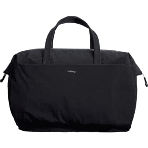 A black duffel bag with two handles and a zip closure, featuring a subtle logo on the front.