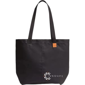 A black tote bag with long handles, featuring a logo at the bottom.