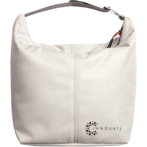 A light grey cooler bag with a textured surface and an adjustable strap, featuring a logo on the front.