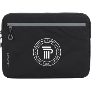 A black laptop sleeve featuring a grey zipper and a circular logo in the centre.