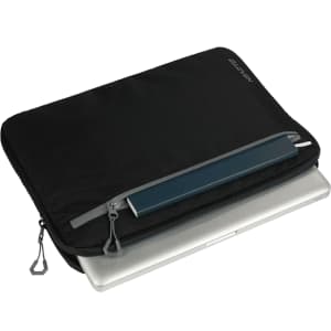 A black laptop sleeve with a grey zipper, containing a silver laptop and a blue item inside.