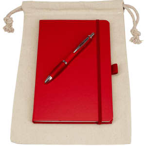 A beige drawstring bag containing a red journal and a red pen, featuring a logo.