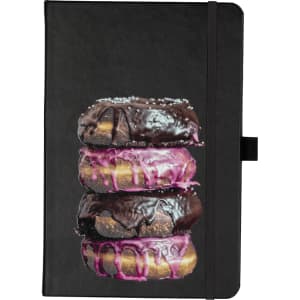 A black journal featuring a design of three stacked donuts with chocolate and pink icing.