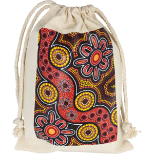 A drawstring bag featuring Aboriginal art with vibrant red, yellow, and black patterns.