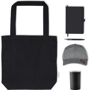 A black tote bag, grey cap, notebook, pen, and stainless steel drink container arranged together.