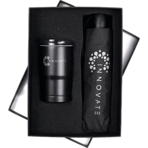 A black tumbler and an umbrella presented in a black gift box with a logo.