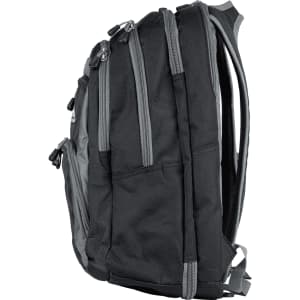 A black and grey backpack with multiple zippered compartments and padded straps, featuring a logo.