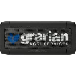 A black speaker and power bank with a mesh front and a logo.