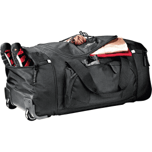 A black wheeled duffel bag with multiple compartments, featuring shoes and sports equipment partially visible.
