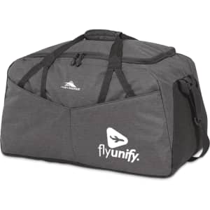 A grey duffel bag with a large compartment and multiple handles, featuring a logo on the front.