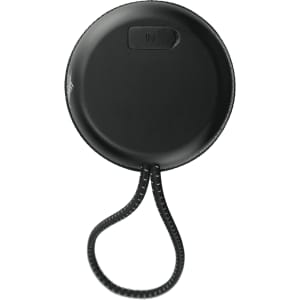A black Bluetooth speaker with a textured surface, featuring a looped strap and a small input section.