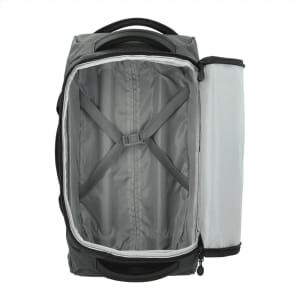 A wheeled duffel bag in grey with an unzipped interior, featuring straps and a side compartment.