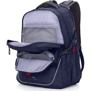 A navy blue backpack with a grey interior and multiple zippered compartments. It has padded straps and a logo.