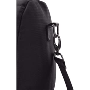 A black duffel bag featuring a sturdy strap attachment point with a metal clip.