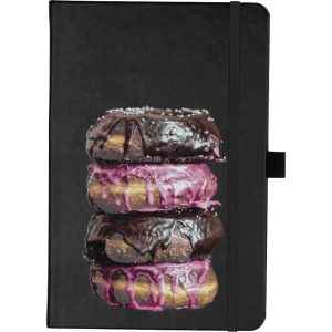 A black journal featuring an image of three decorative doughnuts on the cover. The journal includes an elastic band.