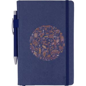 A navy blue journal with a decorative round design and a matching pen attached. It features a logo on the cover.