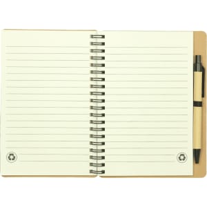 A spiral-bound notebook with blank lined pages in a beige cover, accompanied by a black ballpoint pen.