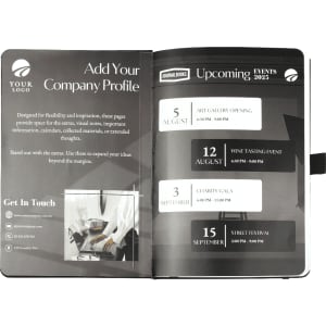 A blank page journal with a black cover and a ribbon bookmark, featuring event listings and a logo.