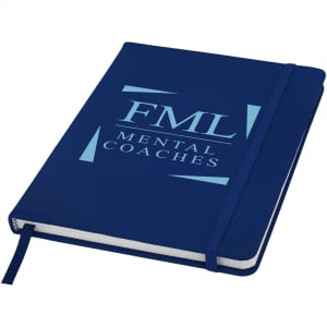 A navy blue hard cover notebook with an elastic band and a ribbon bookmark, featuring a logo on the cover.