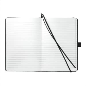 A black recycled marine bound journal with lined pages and a ribbon bookmark, featuring a logo on the cover.