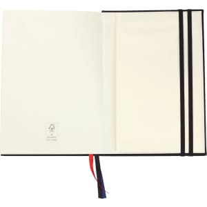 An open diary featuring smooth cream pages with a black cover and a ribbon bookmark in red and blue.