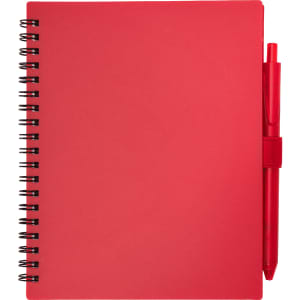A red spiral-bound notebook with a pen attached. The notebook features a smooth cover and a sleek design.