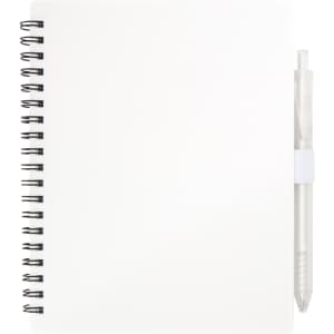 A white recycled journal with a spiral binding and a transparent pen attached.