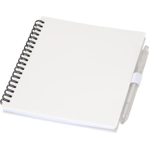 A white spiral-bound journal with a clear pen attached. The journal features a blank cover and has a branding logo.