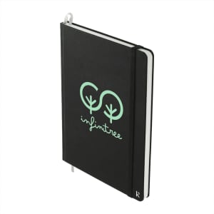 A black hardcover notebook with a green logo design and an elastic band closure. It features a ribbon bookmark.