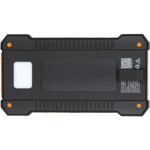 A solar power bank in black and orange, featuring a textured surface and a logo.