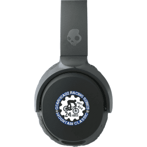 A pair of black Skullcandy Riff Wireless headphones with a logo on one ear cup.