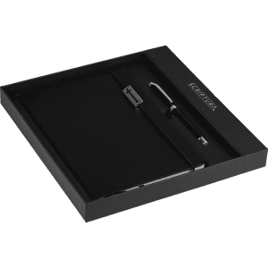 A black notebook and pen set presented in a sleek black box, featuring a logo on the cover.