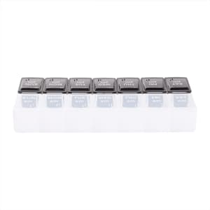 A clear pill case with grey lids labelled for each day and time for medication organisation.