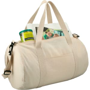 A light beige barrel duffel bag featuring two handles, a shoulder strap, and an external pocket with items inside.