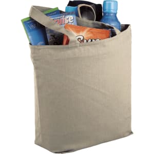 A beige zippered tote bag filled with a drink bottle, snacks, and a magazine. It features sturdy handles and a logo.