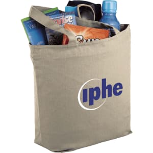 A beige zippered tote bag with various items inside, including a drink bottle, brochures, and snacks. It has a logo.