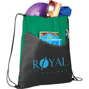 A green and black drawstring sportspack, filled with a frisbee, sunglasses, and various items, featuring a logo.