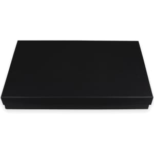A black rectangular box design for the Trekk Cheeseboard Set, featuring a sleek and smooth finish.