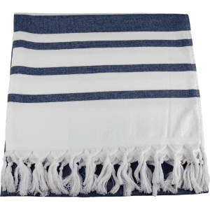 A Turkish beach towel in navy blue and white, featuring striped patterns and tasselled edges. It has a branding logo.