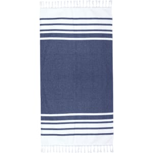 A navy blue and white Turkish beach towel with striped patterns and tasselled edges. It features a logo.