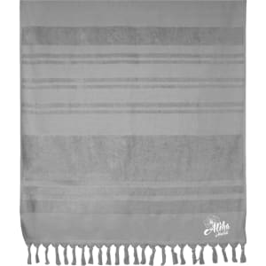 A grey flat towel with striped patterns and tassels along the bottom, featuring a logo in the corner.