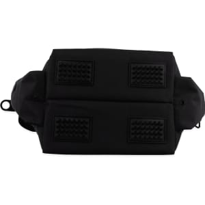 A black cooler bag with textured underside and two compartments, featuring a logo. Suitable for carrying beverages.
